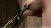 Bokep 3GP Brunette slave Proxy Paige in blue lingerie bound in slightly squat position in metal device gets nipples clamped and tied then caned and whipped online