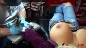 Nonton Film Bokep Busty blonde pornstar pulls out her huge tits while getting a tattoo on her wrist terbaik